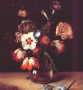 de bray flowers in glass vase