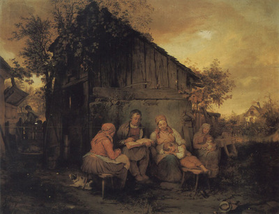 A Family Resting At Sunset