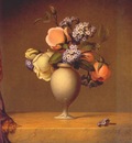 heade roses and heliotrope in vase on marble tabletop