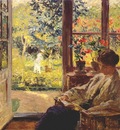 melchers woman reading by a window c1905