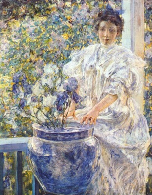 reid woman on a porch with flowers c1906