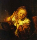 Rembrandt A Young Woman Trying on Earings