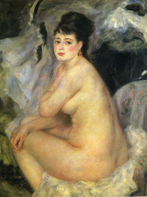nude seated on a sofa
