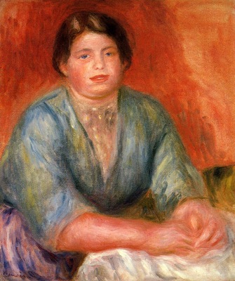 seated woman in a blue dress