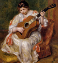 woman playing the guitar