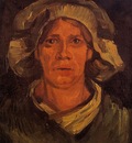 head of a peasant woman with white cap