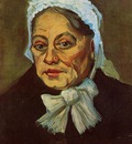 head of an old woman in a white cap