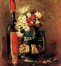 vase with carnations and roses and a bottle