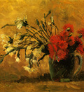 vase with red and white carnations on a yellow background