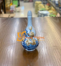 Nậm rượu trên bàn thờ Thần Tài Ông Địa
